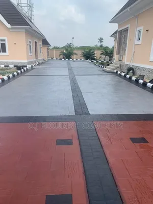 Gray and Red Stamped Concrete Flooring