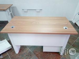 Light Brown And White Table With Mobile And Metal Legs