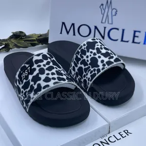 Photo - Original Luxury Men's Slides Moncler Available In Store 🏬