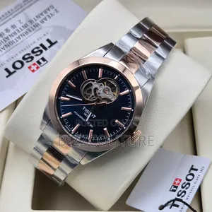 Original Tissot Gold and Silver Stainless Steel Watch.