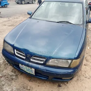 Photo - Nissan Primera 2002 Blue
