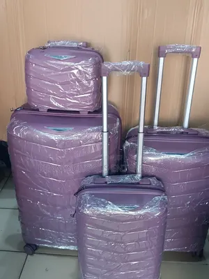 Photo - Set of 4 Fl Purple Unbreakable Elastic Rubber Travel Luggage