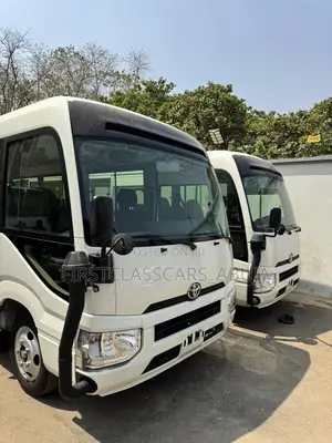 Photo - New Toyota Coaster 2023 White