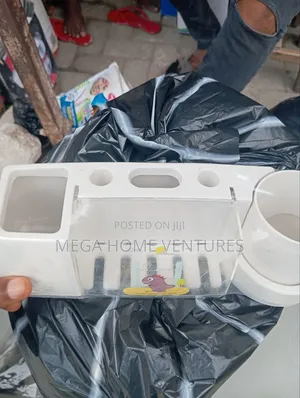 Toothpaste Dispenser With Brush Holder