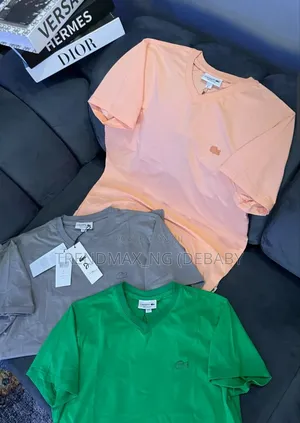 Photo - Lacoste v-Neck Tops