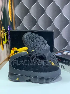 Photo - Original Air Jordan 9 Retro Black Sneakers