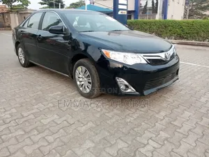 Photo - Toyota Camry LE 4dr Sedan (2.5L 4cyl 6A) 2013 Black