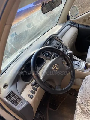 Photo - Toyota Highlander V6 2006 Beige