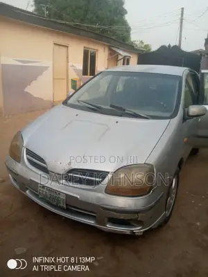 Photo - Nissan Almera Tino 2004 Silver
