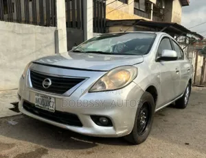 Photo - Nissan Almera 2013 Silver