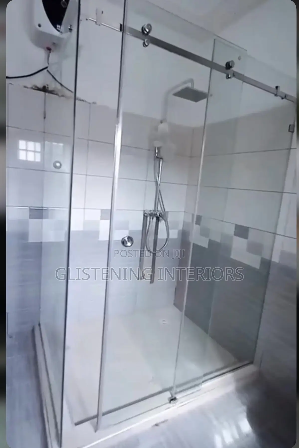 Sliding Shower Cubicle With A Silver Accessories