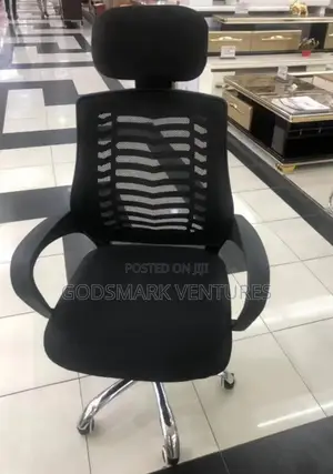 Durable Office Chair Swivel With Headrest for Staff Use.