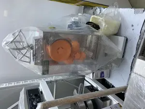 Photo - Automatic Orange Juice Extractor