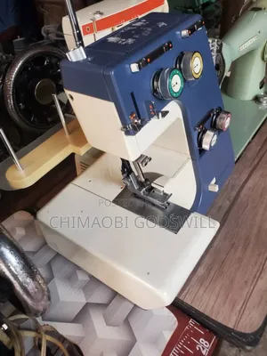 Photo - Electric Four Thread Weaving Machine