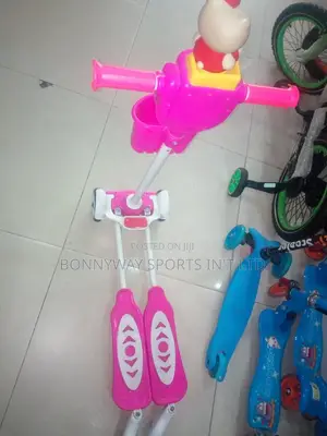Children Riding Scooters