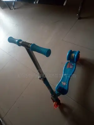 Children Riding Scooters