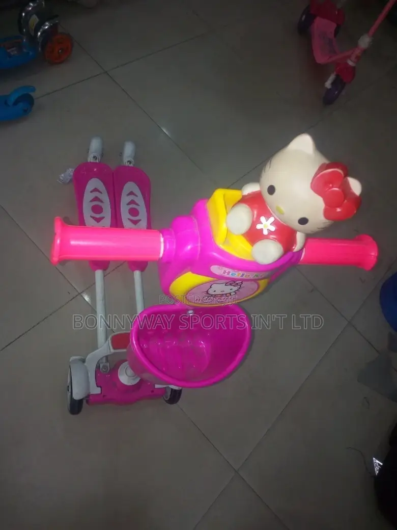 Children Riding Scooters
