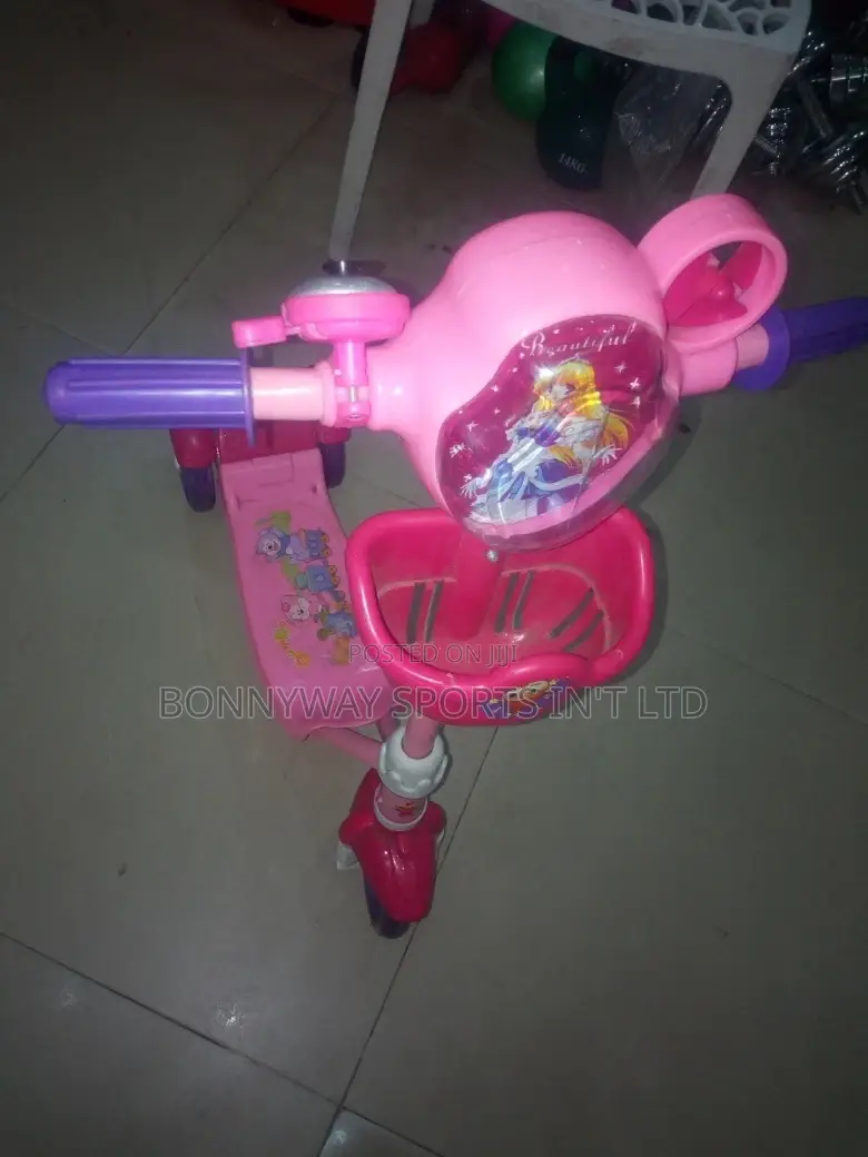 Children Riding Scooters