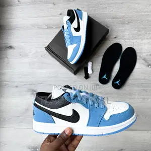 Photo - Original Air Jordan 1 Low Retro Unc Sneakers