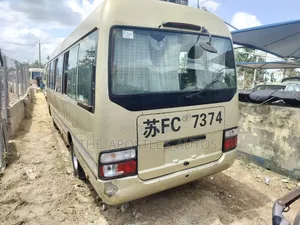 Toyota Coaster 2014 Gold