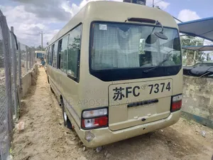 Toyota Coaster 2014 Gold