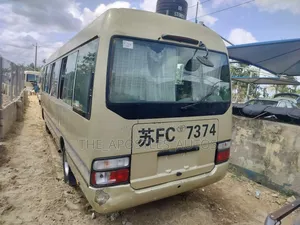 Toyota Coaster 2013 Gold