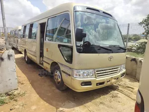 Toyota Coaster 2013 Gold