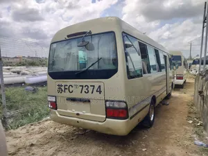Toyota Coaster 2012 Gold