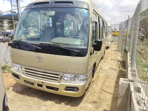 Toyota Coaster 2012 Gold