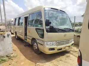 Toyota Coaster 2015 Gold