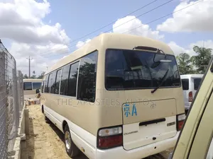 Toyota Coaster 2014 Gold