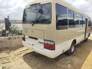 Toyota Coaster 2014 Gold