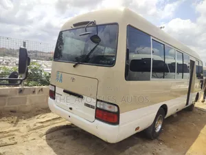 Toyota Coaster 2015 Gold