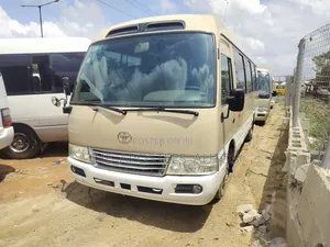 Toyota Coaster 2015 Gold