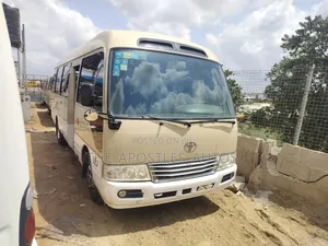 Toyota Coaster 2015 Gold