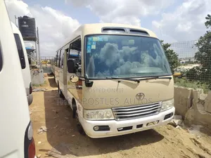 Toyota Coaster 2015 Gold