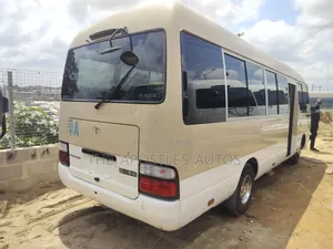 Toyota Coaster 2014 Gold