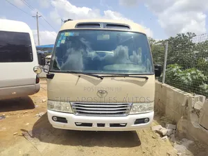 Toyota Coaster 2014 Gold
