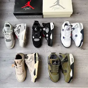 Photo - Original Air Jordan 4 Retro Sneakers