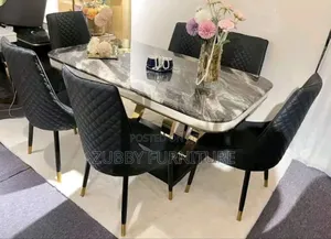 Quality and Imported Marble Top Dining Table by 6 Chairs
