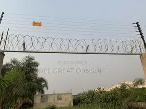Photo - Electric Fence Wire and Razor Barb Wire for Residential