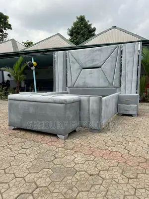 A 6/6 Bed Frame Attached With An Ottoman