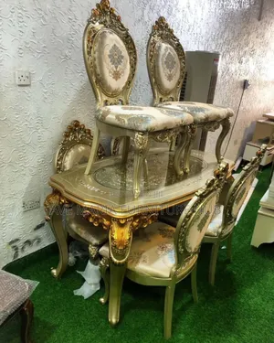 Royal Dinning Table and Chairs.