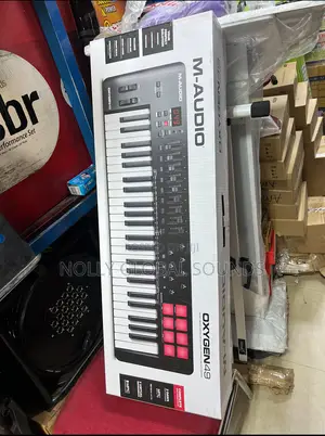 M-Audio Oxygen 49. 49 Key Usb Midi Controller With Beat Pads