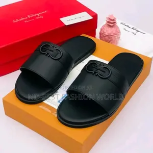 Black Leather Ferragamo Slippers