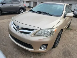 Toyota Corolla L 4dr Sedan (1.8L 4cyl 5M) 2012 Gold