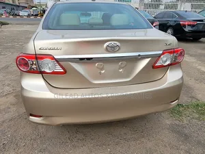 Toyota Corolla L 4dr Sedan (1.8L 4cyl 5M) 2012 Gold