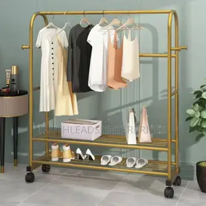 Gold Garments Display Stand
