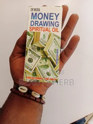 Photo - Original Money Drawing Spiritual Oil For Both Men And Women