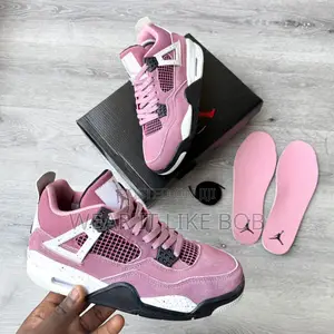 Photo - Nike Air Jordan 4 Retro “Orchid”